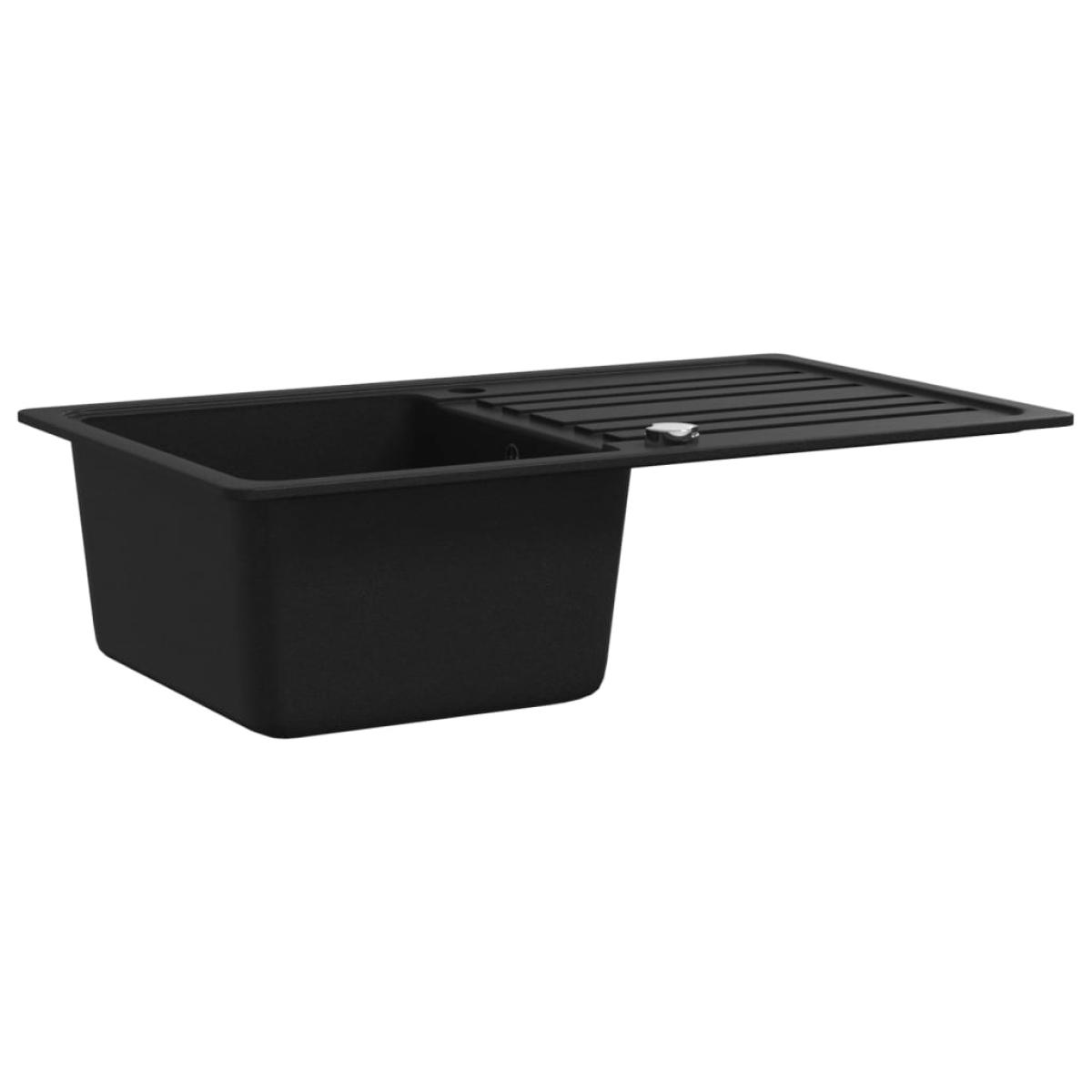 Fregadero de cocina de granito con un seno y escurridor negro