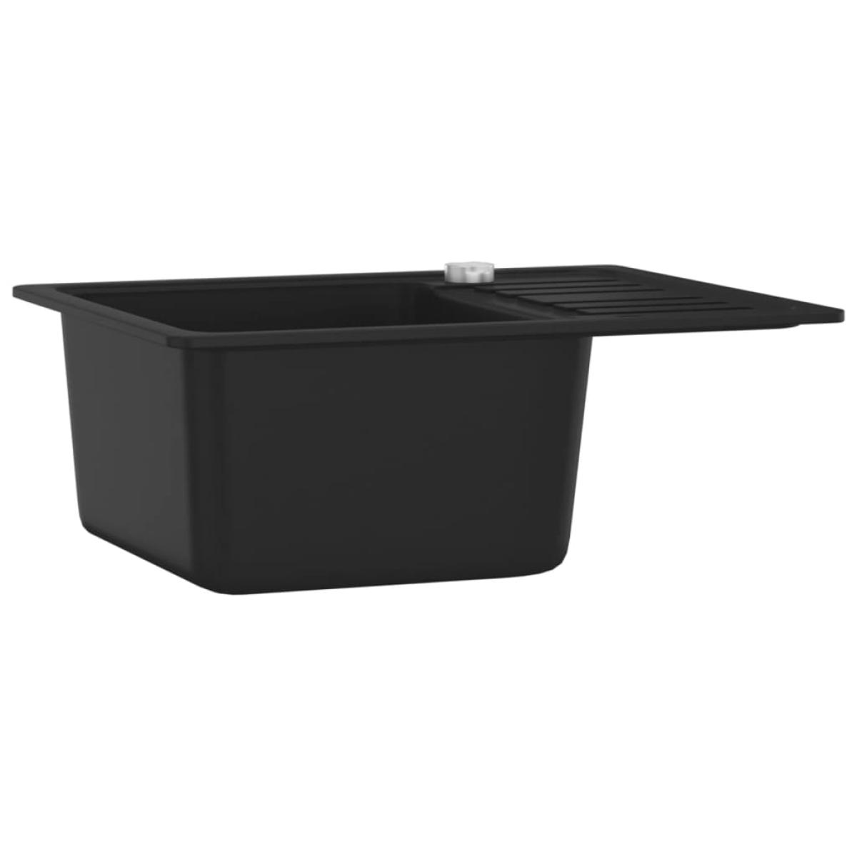 Fregadero de cocina de granito con un seno negro