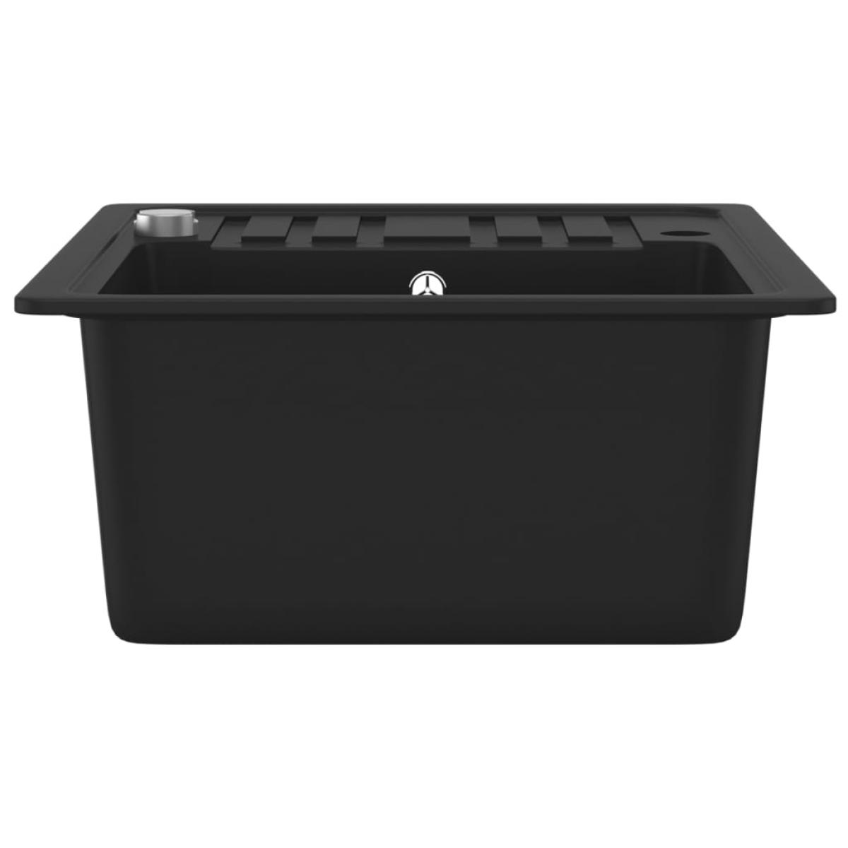 Fregadero de cocina de granito con un seno negro