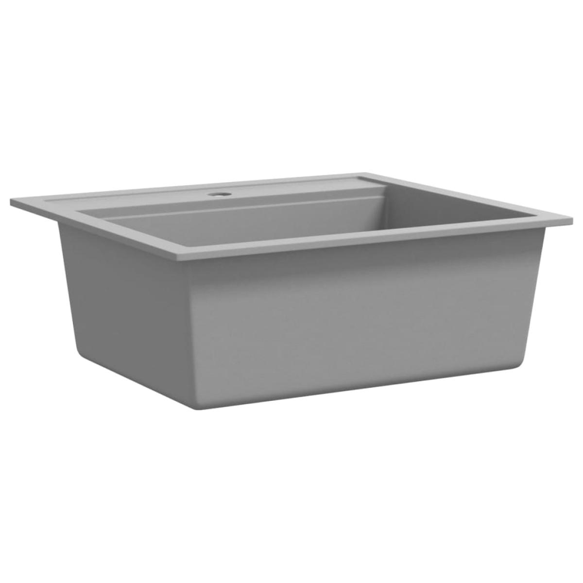 Fregadero de cocina de granito con un seno gris