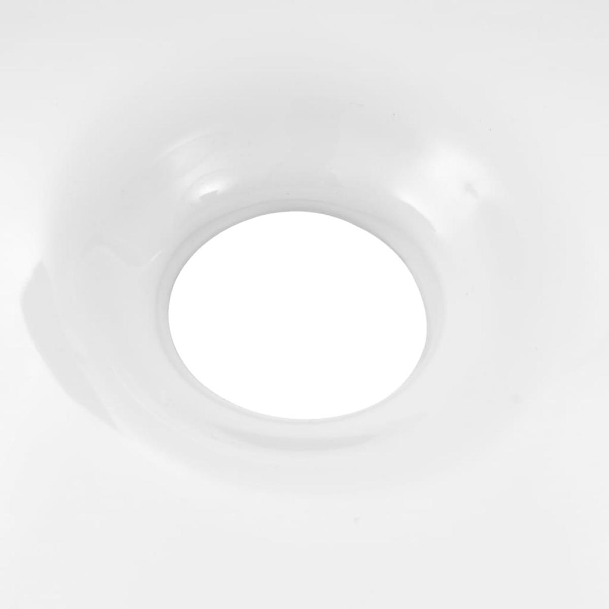 Lavabo de cerámica triangular blanco 645x455x115 mm