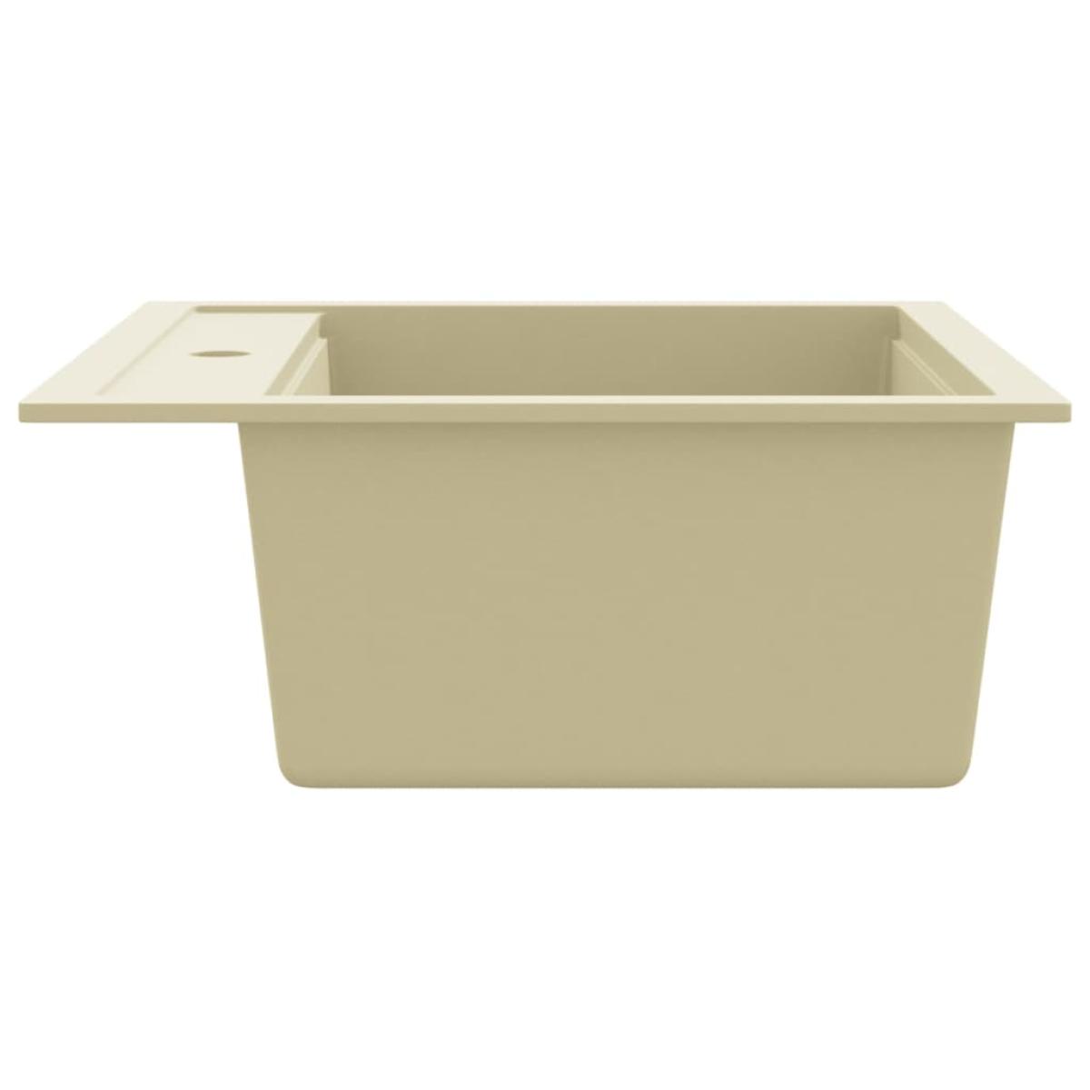 Fregadero de cocina de granito con un seno beige