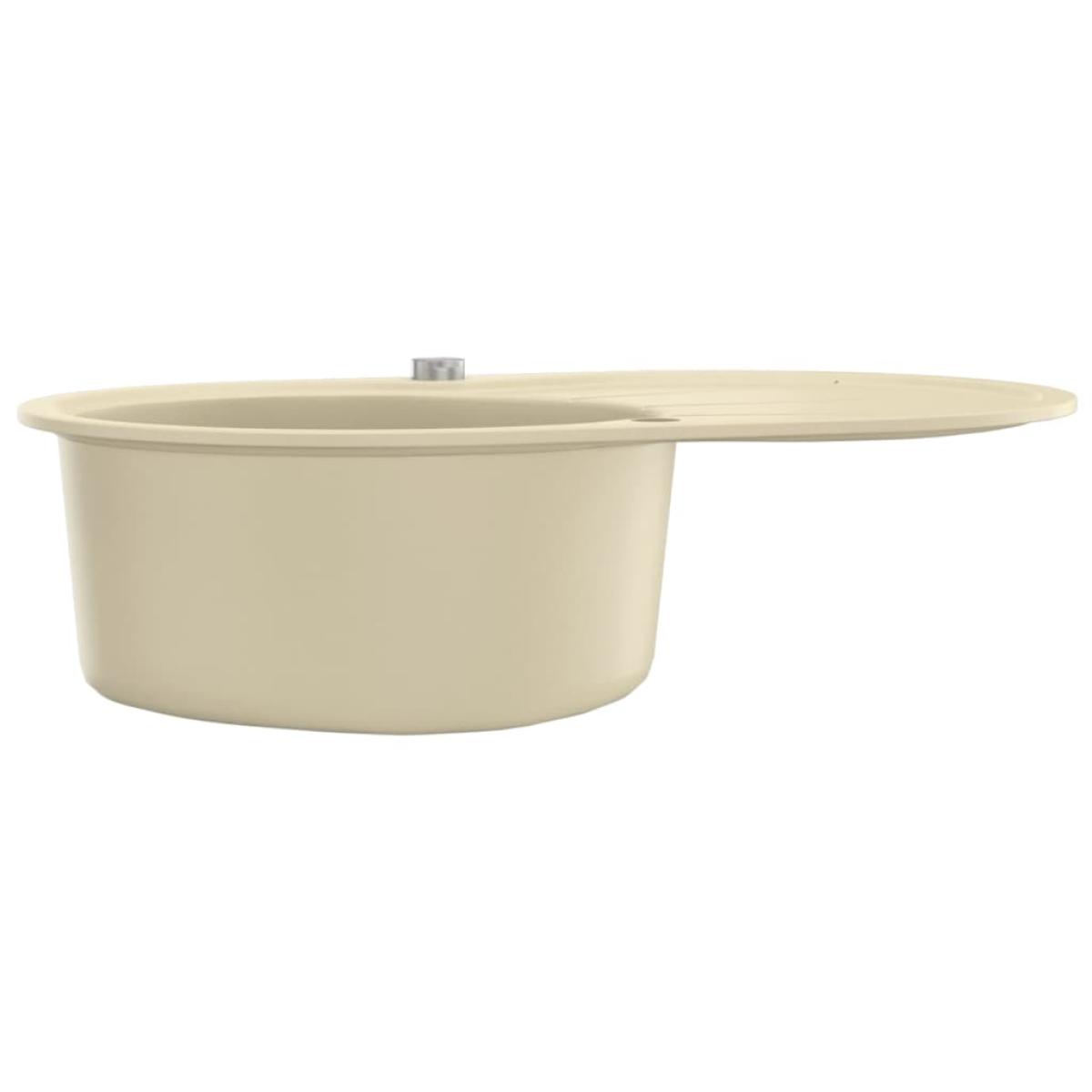 Fregadero de cocina de granito con un seno ovalado beige