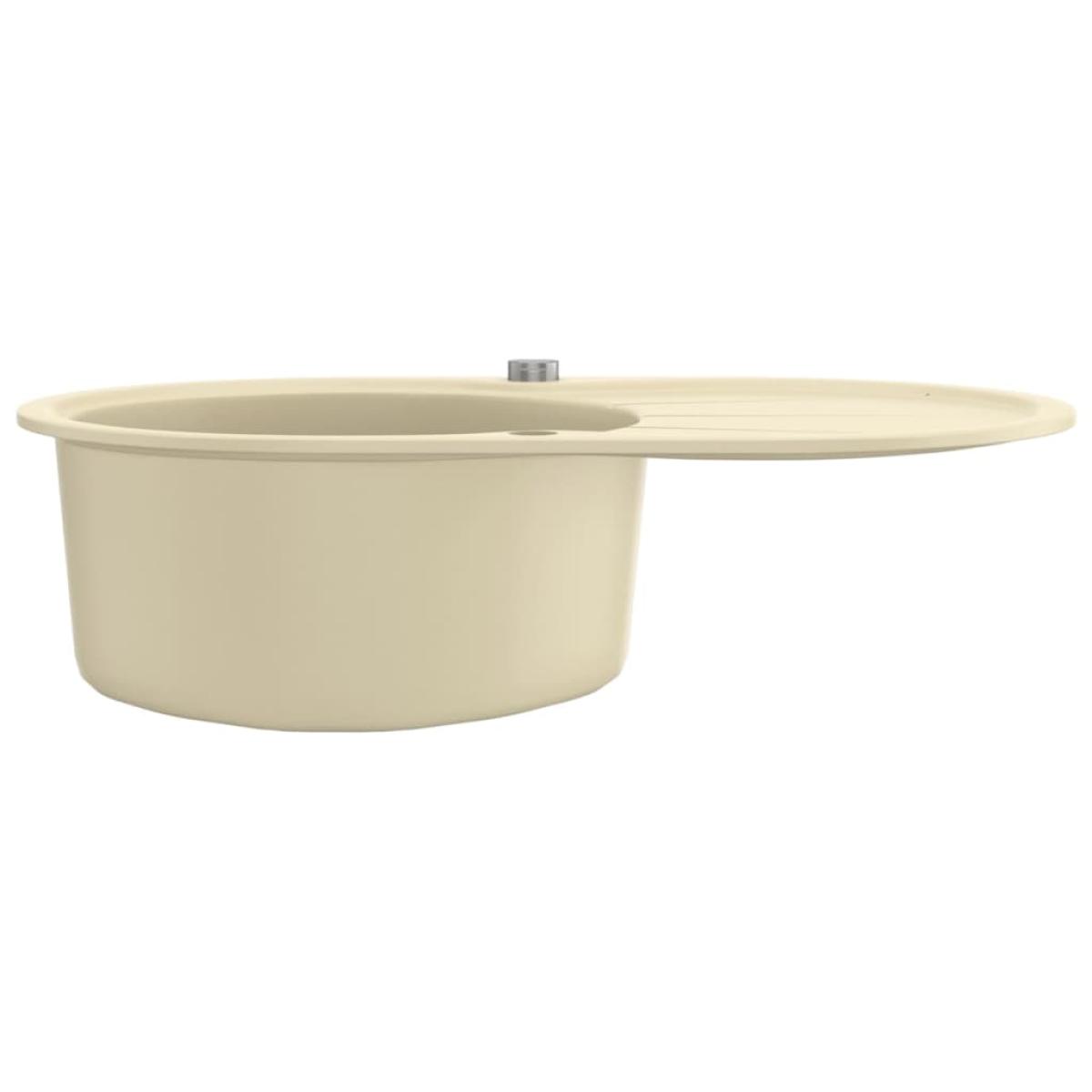 Fregadero de cocina de granito con un seno ovalado beige