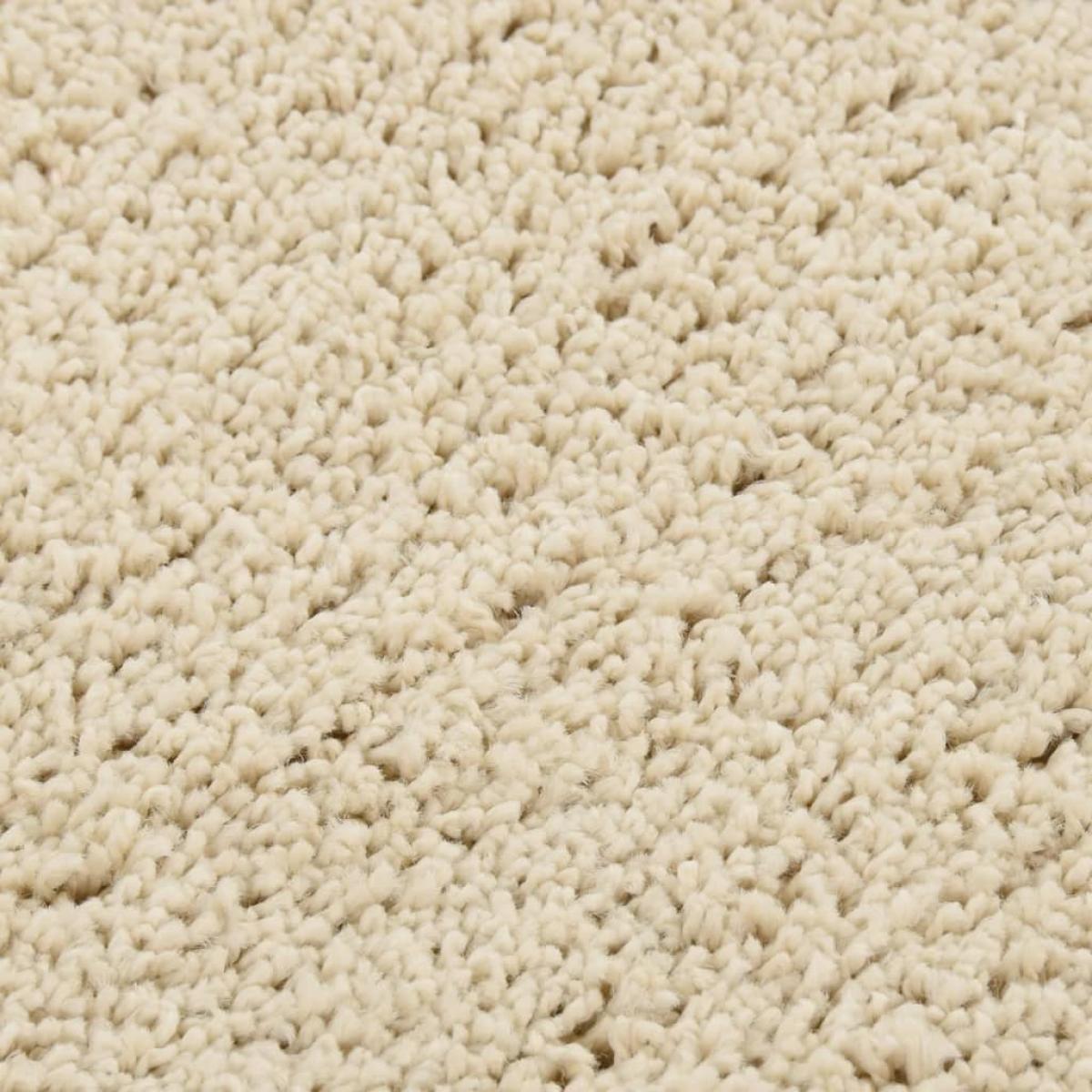 Alfombra peluda antideslizante color crema 140x200 cm