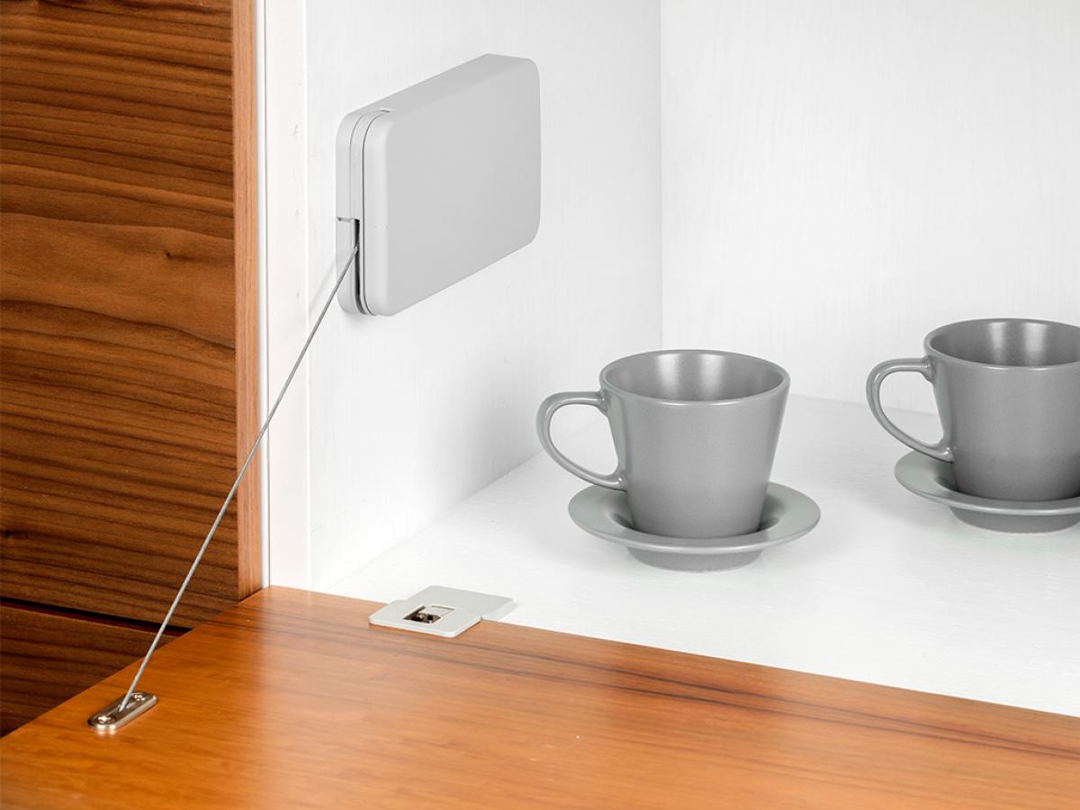 Mecanismo para puertas abatibles Miniwinch con tapa