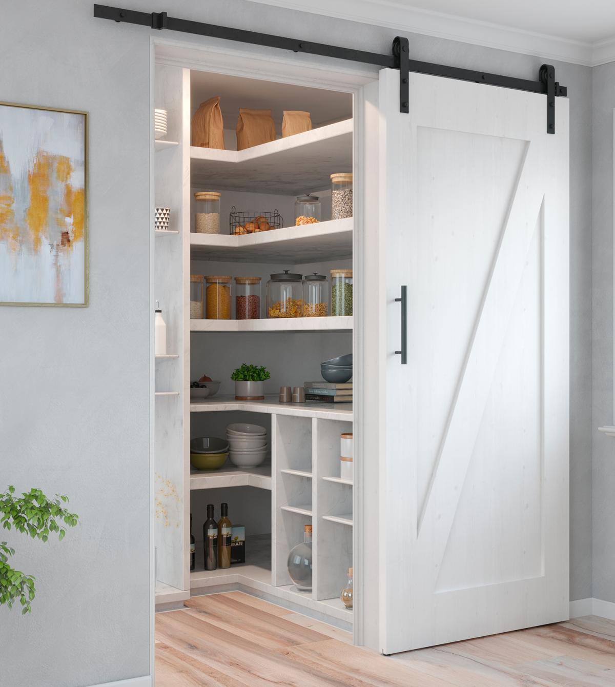 Sistema Barn para puertas correderas colgadas de madera
