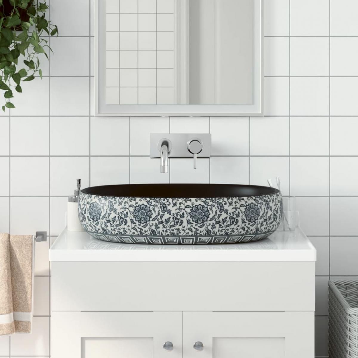 Lavabo sobre encimera ovalado cerámica negro y azul 59x40x14 cm