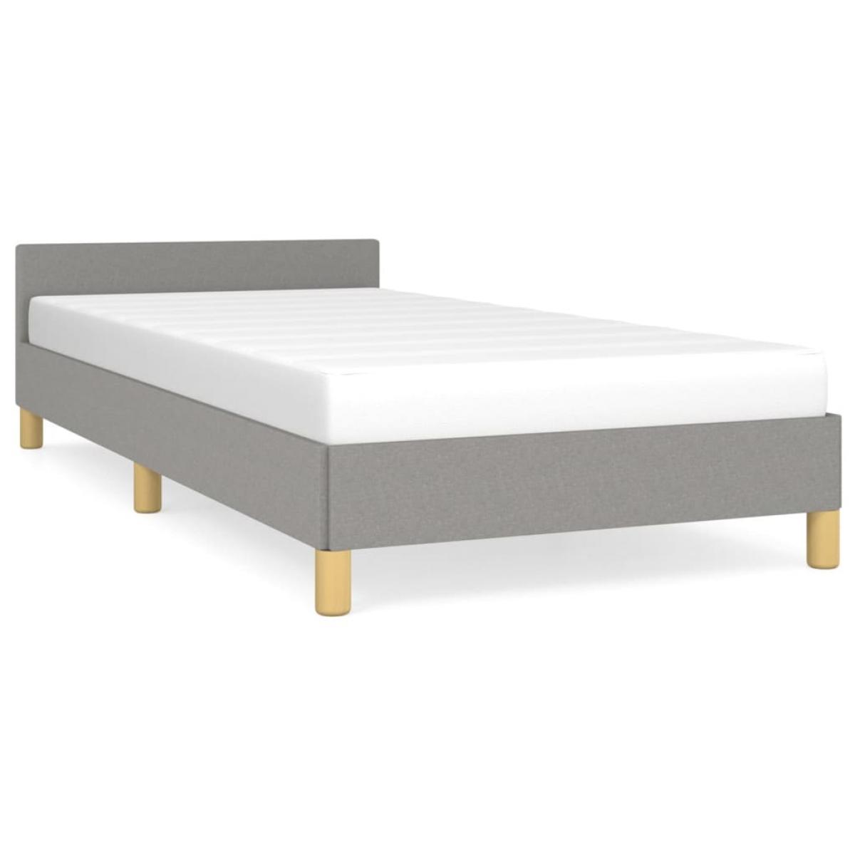Estructura de cama con cabecero de tela gris claro 90x200 cm