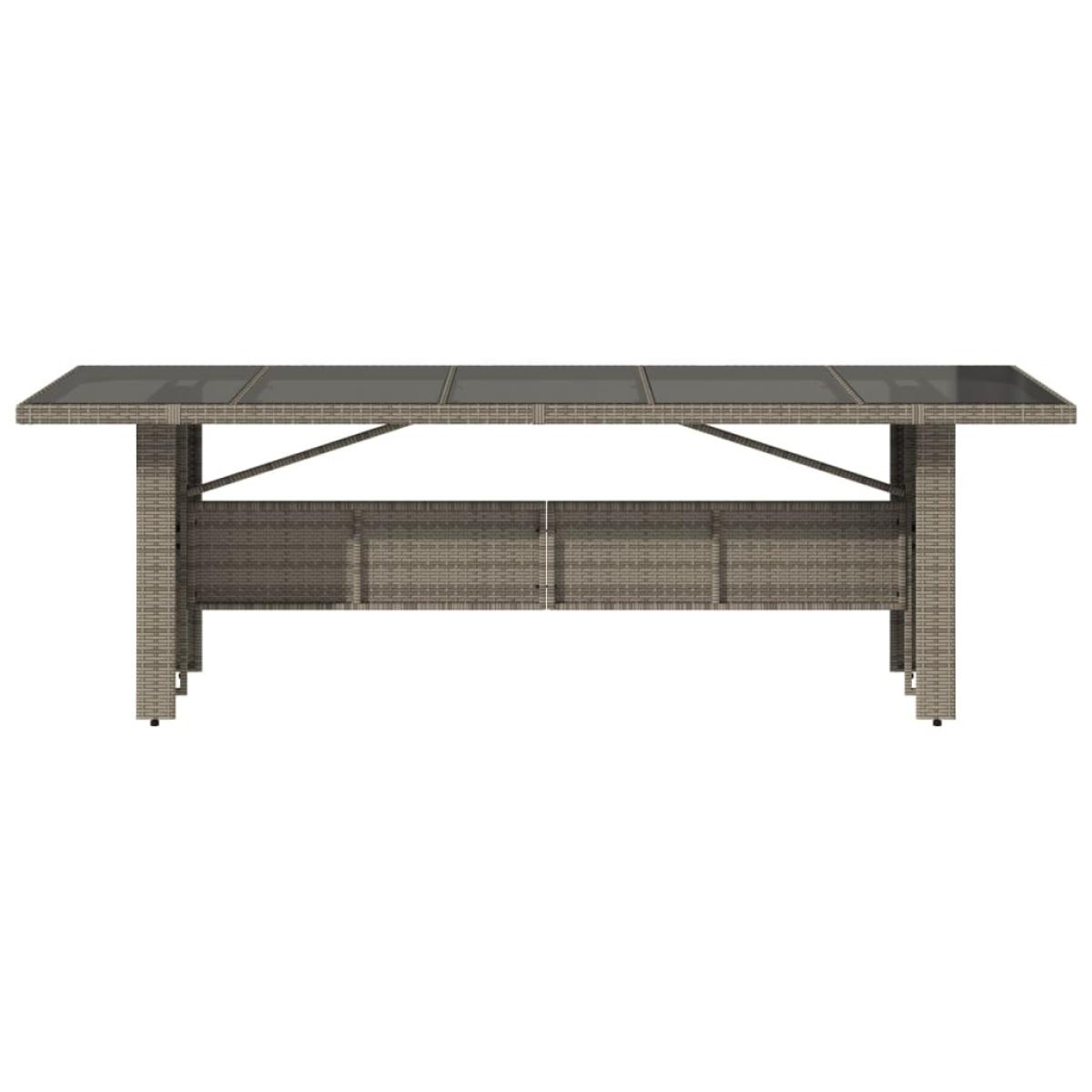 Mesa de jardín superficie de vidrio ratán PE gris 240x90x75 cm