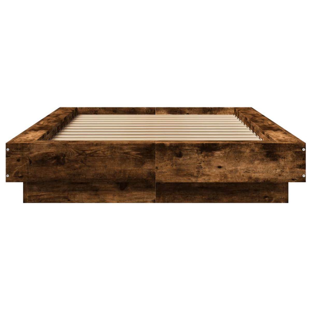 Estructura de cama con luces LED madera roble ahumado 90x200 cm