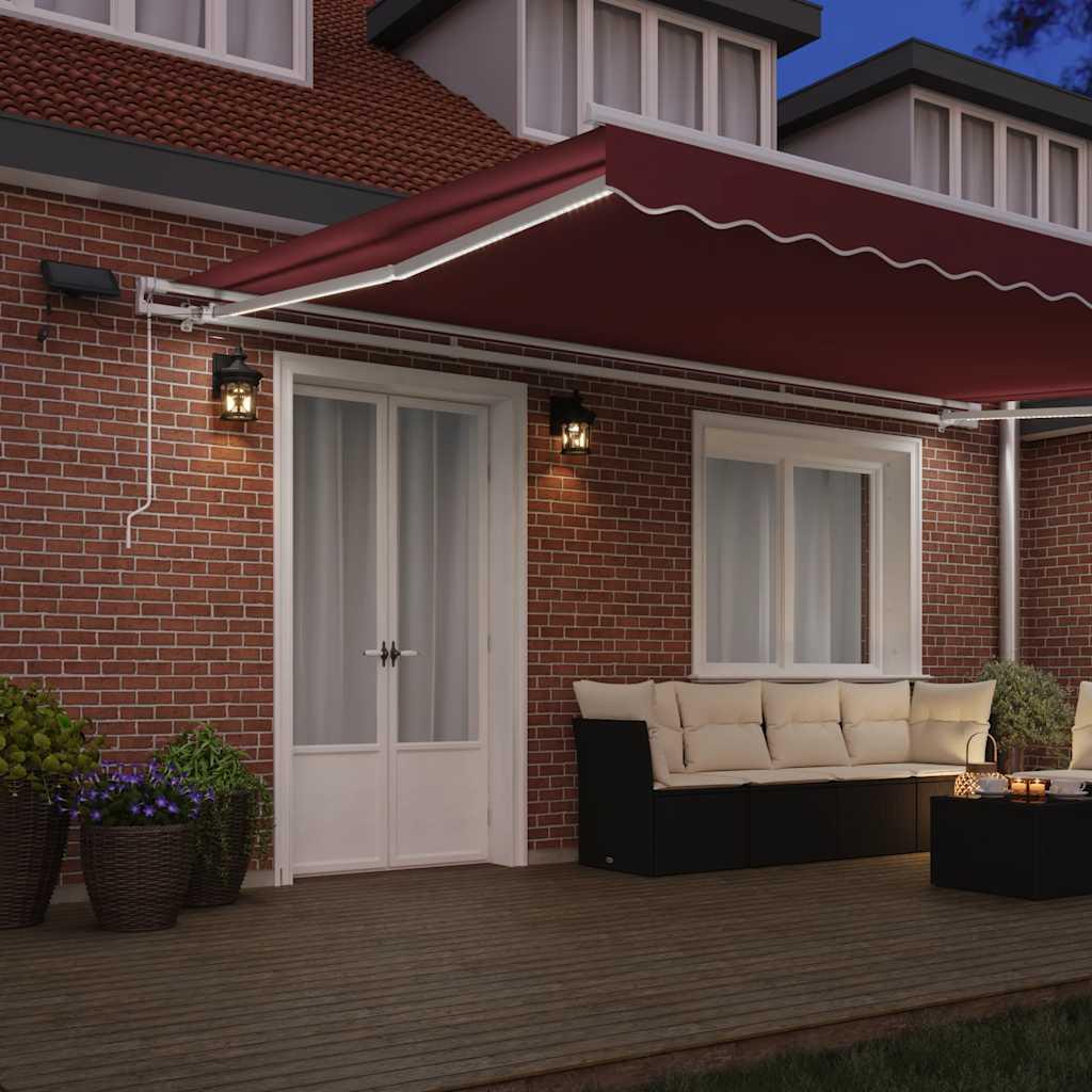 Toldo retráctil manual con luces LED antracita blanco 600x300cm