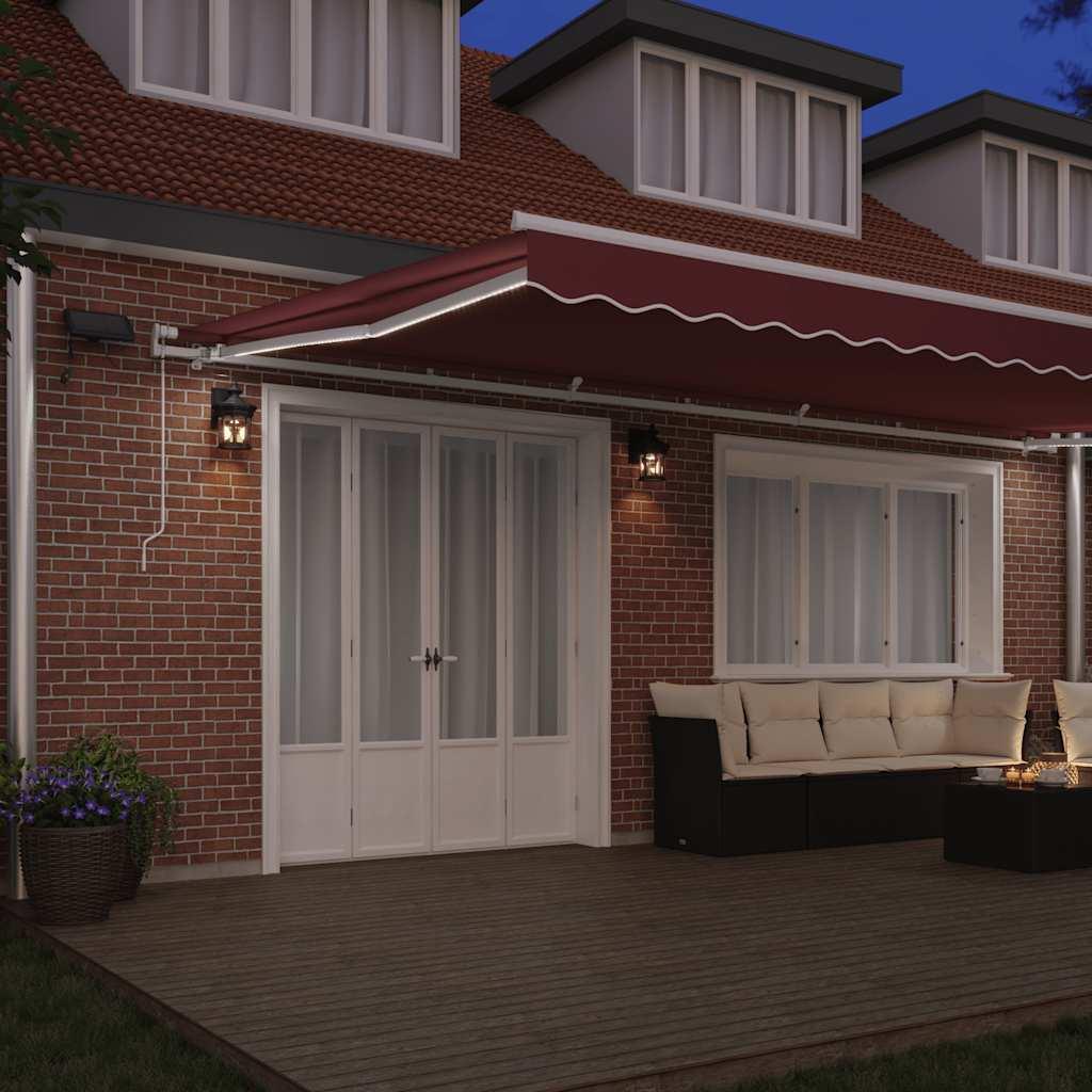 Toldo retráctil manual con luces LED antracita blanco 600x300cm