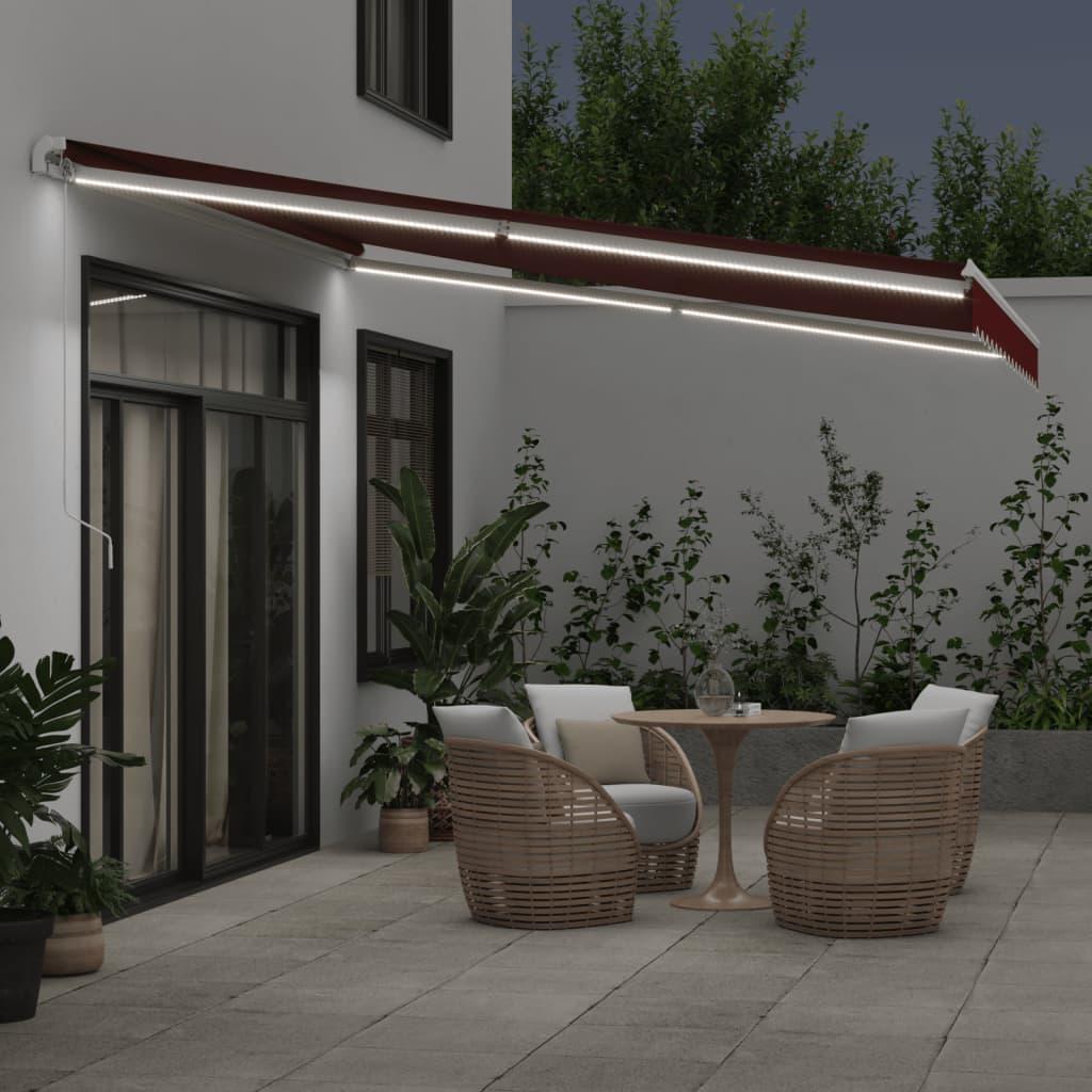 Toldo retráctil manual con luces LED antracita blanco 600x300cm