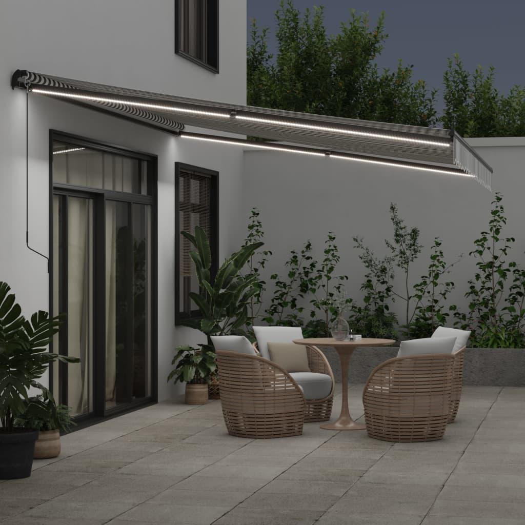 Toldo retráctil manual con luz LED amarillo y blanco 500x300 cm