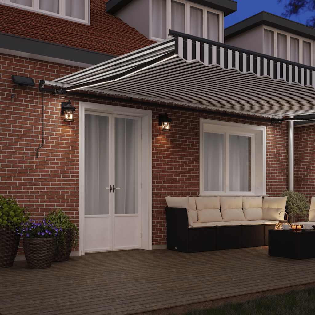 Toldo retráctil manual con luz LED amarillo y blanco 500x300 cm