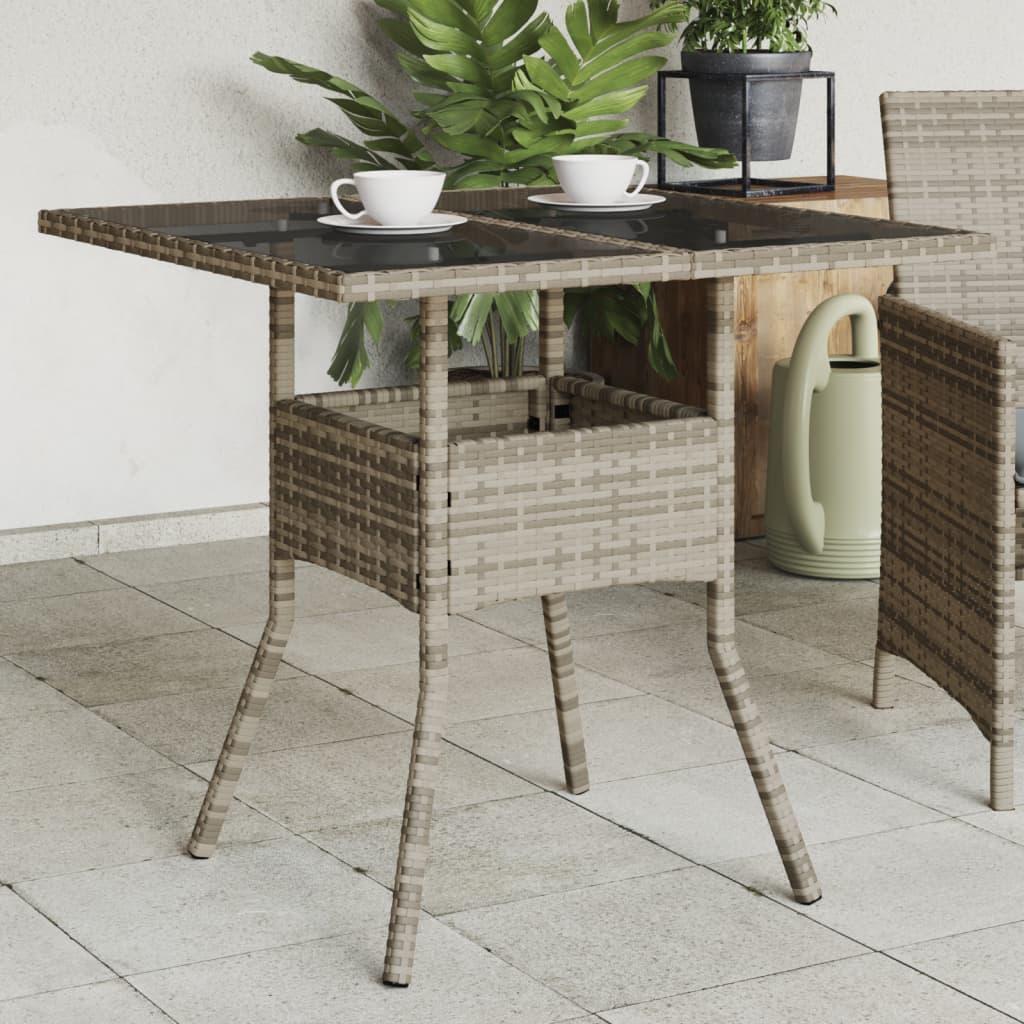 Mesa de jardín superficie de vidrio ratán PE negro 115x54x74 cm