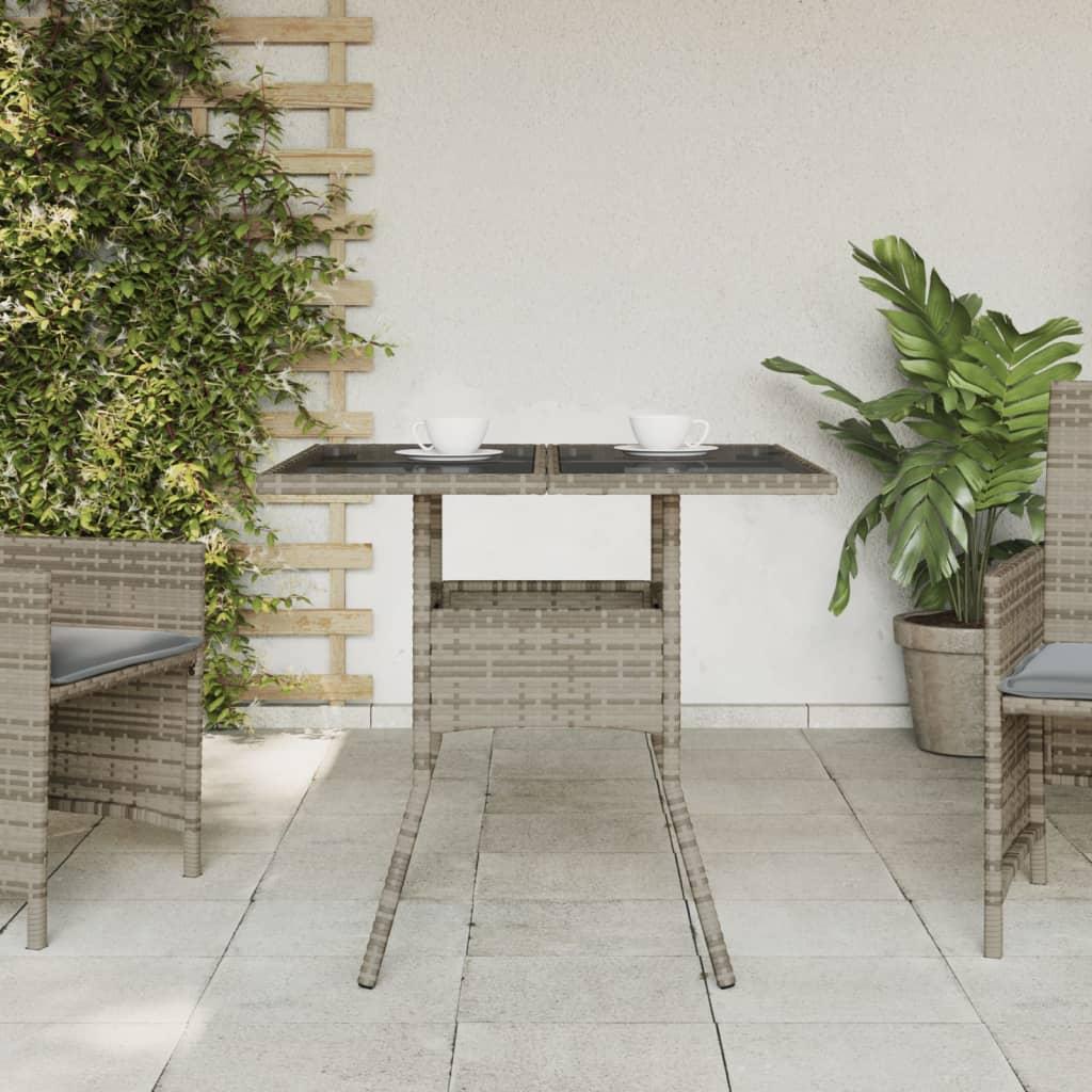 Mesa de jardín superficie de vidrio ratán PE negro 115x54x74 cm