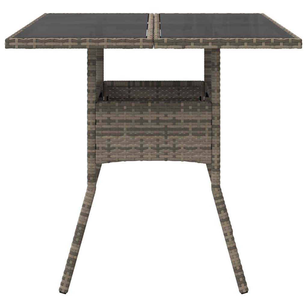 Mesa de jardín superficie de vidrio ratán PE negro 115x54x74 cm