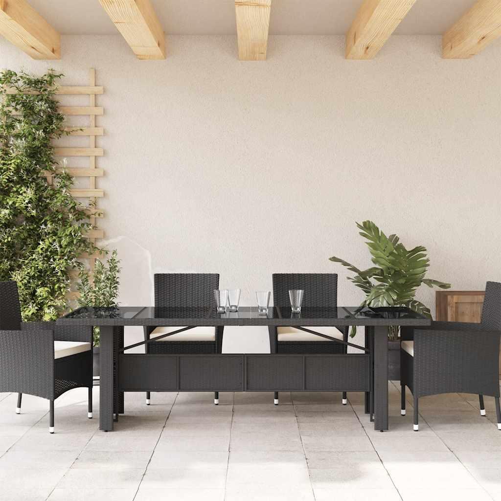 Mesa de jardín superficie de vidrio ratán PE negro 150x90x75 cm