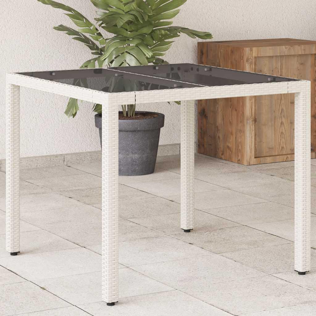 Mesa de jardín superficie de vidrio ratán PE negro 115x54x74 cm