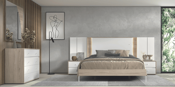Dormitorio moderno con cama doble, cabecero con iluminación LED, mesitas de noche y cómoda blanca de diseño nórdico, ideal para checklist de muebles para primera mudanza.